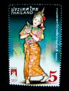 A stamp printed in Thailand shows an image of woman in Thai musical folk drama costume on on value at 5 baht.